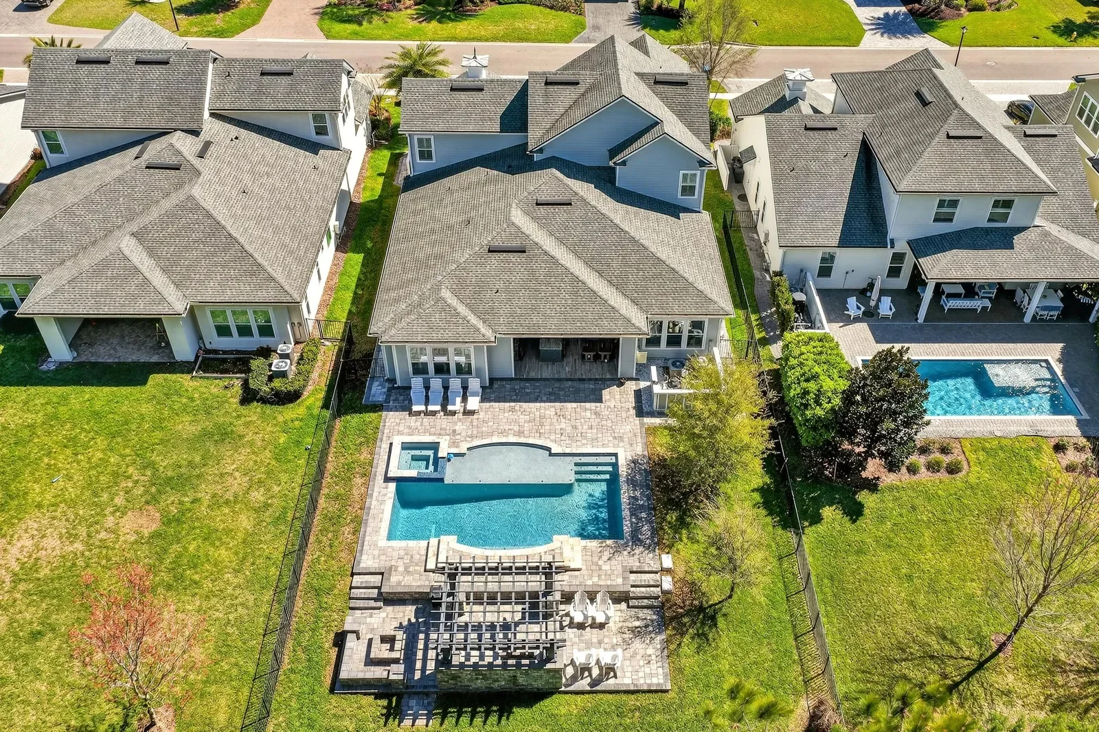 Drone photo of a new estate with pool in St. Johns, FL. Drone photography by Megapixeler