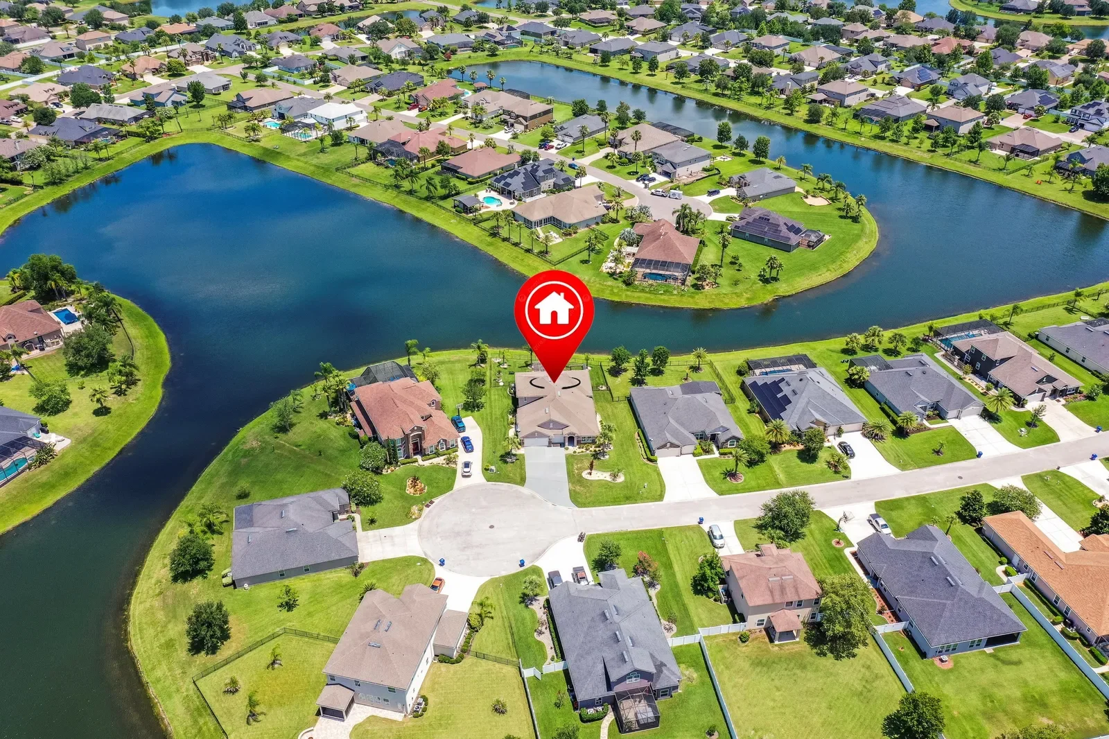 Drone photo with location pin over a lakeside neighborhood in St. Augustine, FL. Drone photography by Megapixeler
