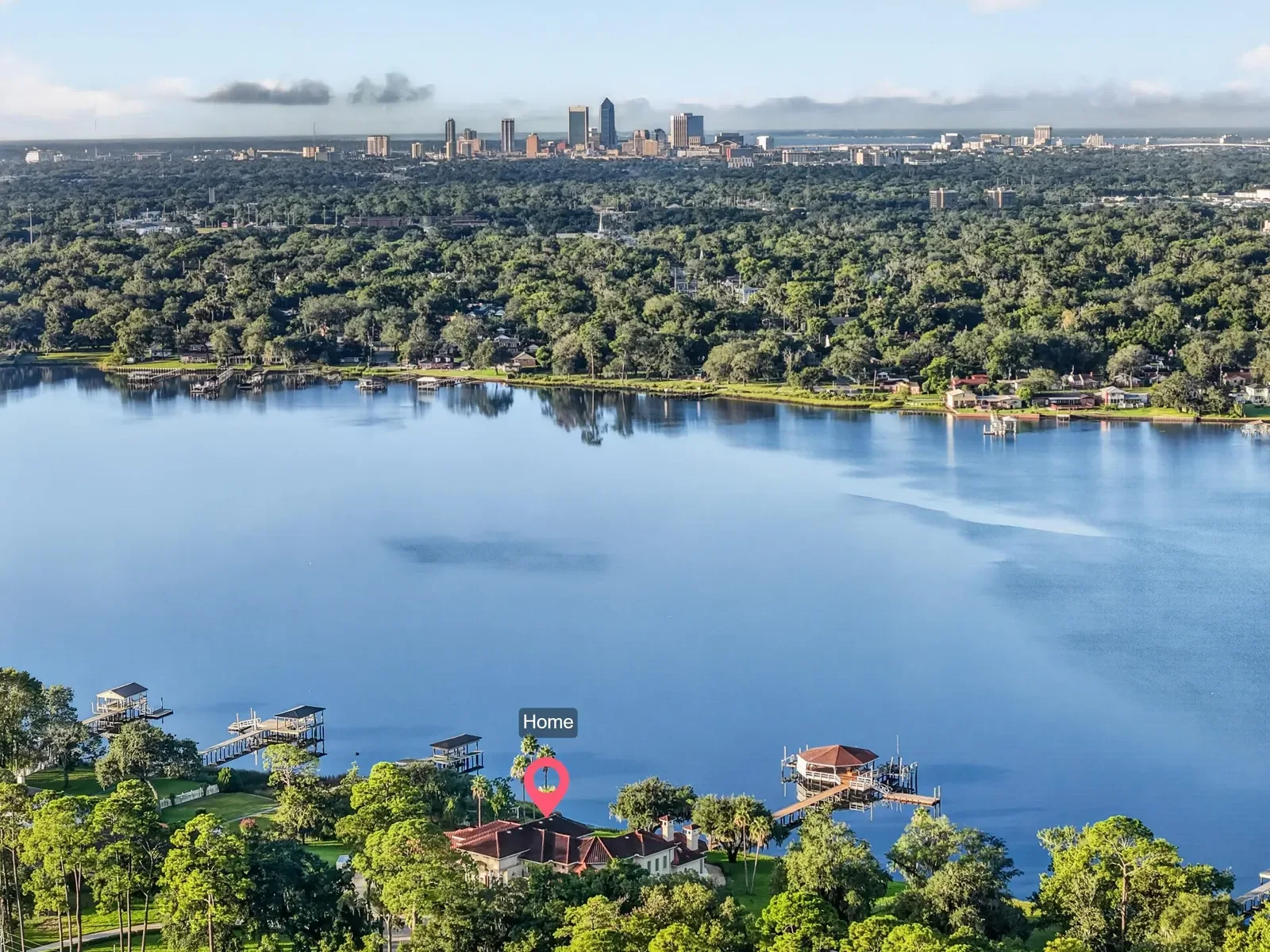 Drone view across the St. Johns River toward the downtown Jacksonville skyline in North Florida. Drone photography by Megapixeler