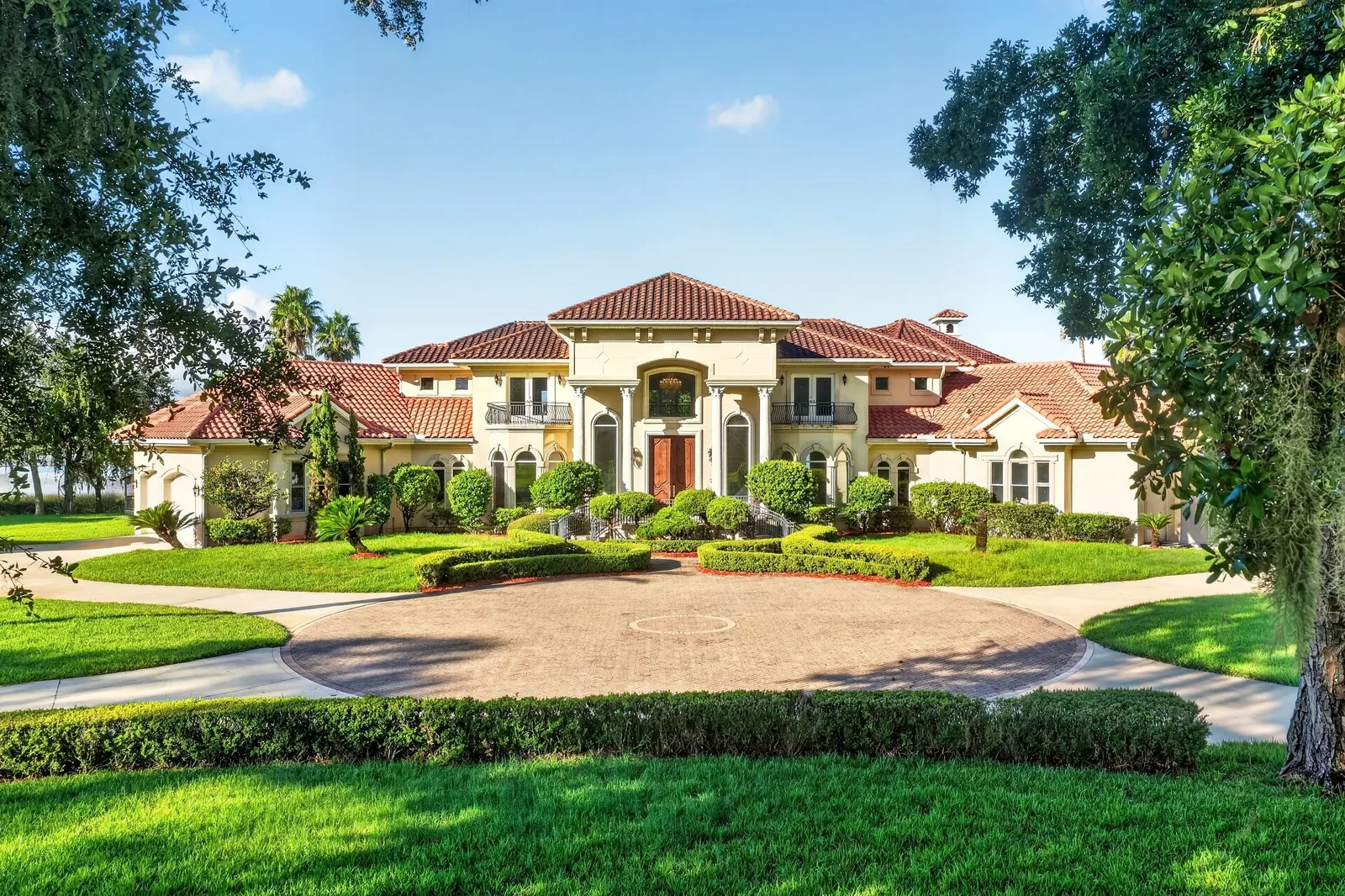 Mediterranean riverfront estate with motor court in Jacksonville, FL. Real estate photography by Megapixeler