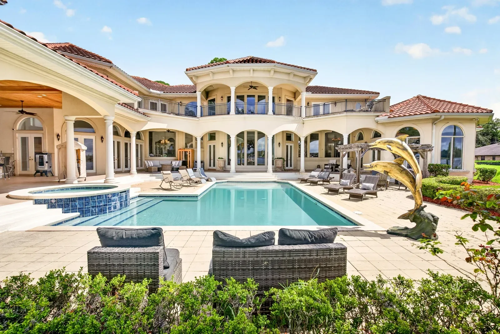 Resort pool and loggia on the St. Johns River in Jacksonville, FL. Real estate photography by Megapixeler