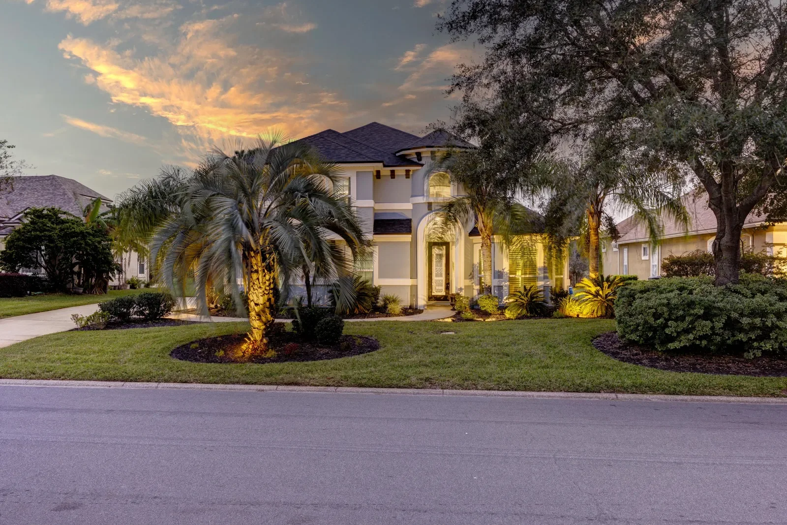 Twilight photo of a golf-course home in St. Johns, FL. Twilight photography by Megapixeler
