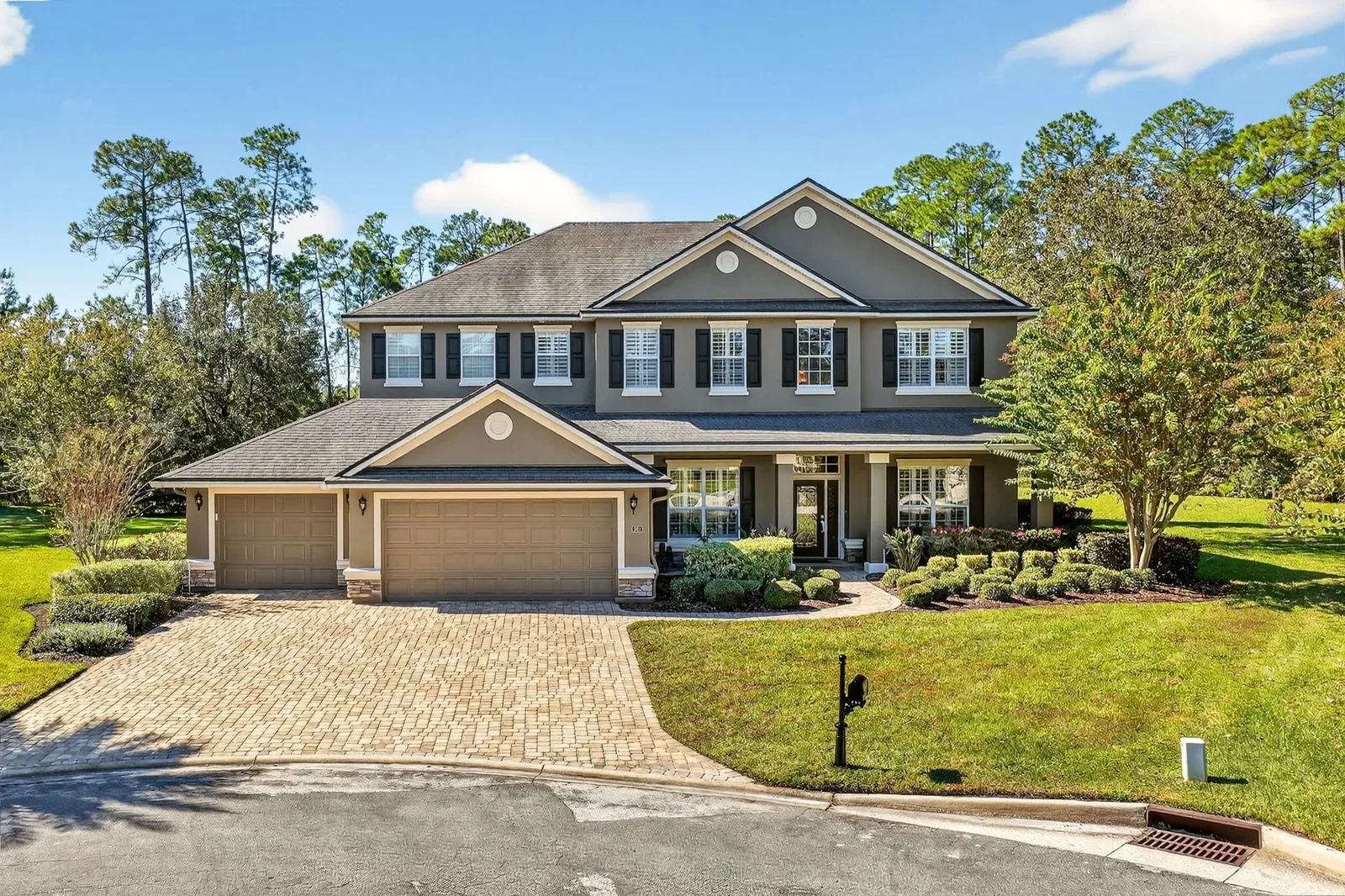 Two-story home on a wooded lot in Fruit Cove, FL. Real estate photography by Megapixeler